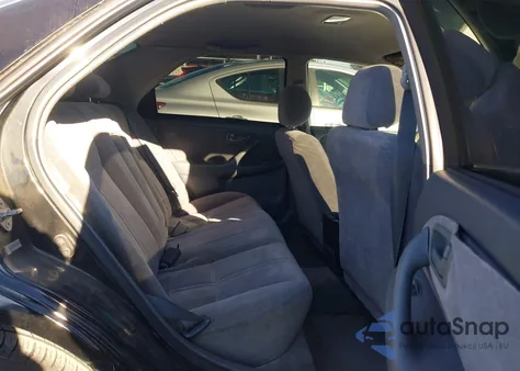 1999 Toyota Camry Le from USA, damaged, VIN JT2BG22K8X0292434